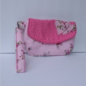 Handmade quilted wristlet purse w strap. Pink floral w heart.